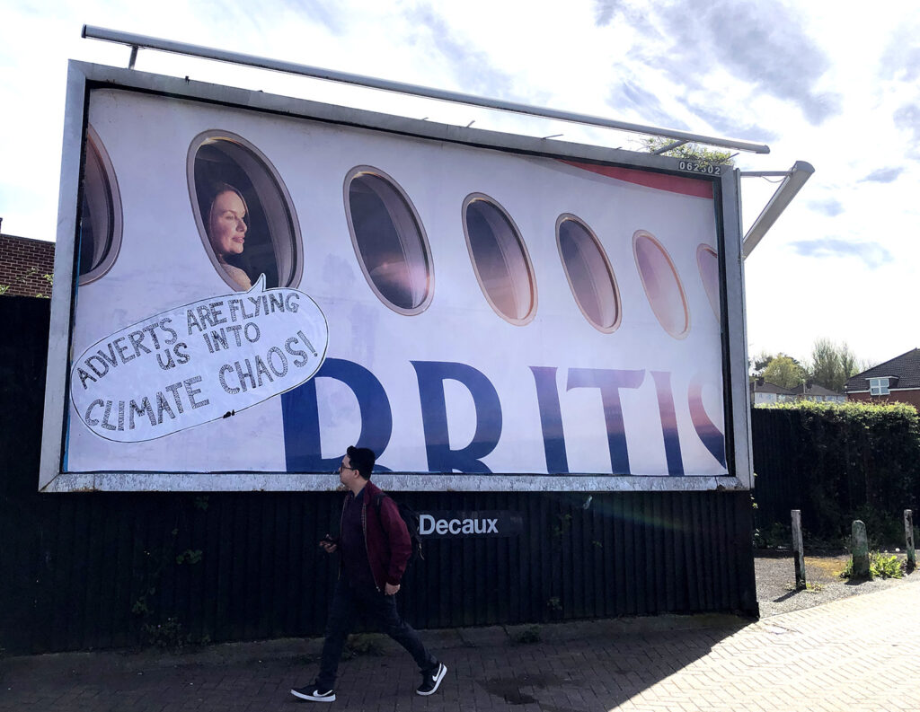 a subvertising billboard as part of the week of action against airline advertising